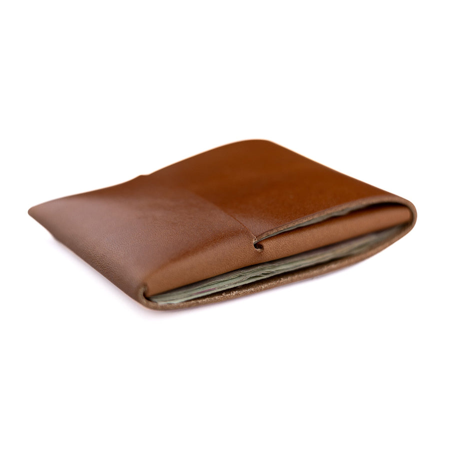Brown Franklin 2 leather wallet, closed side profile showing folded leather