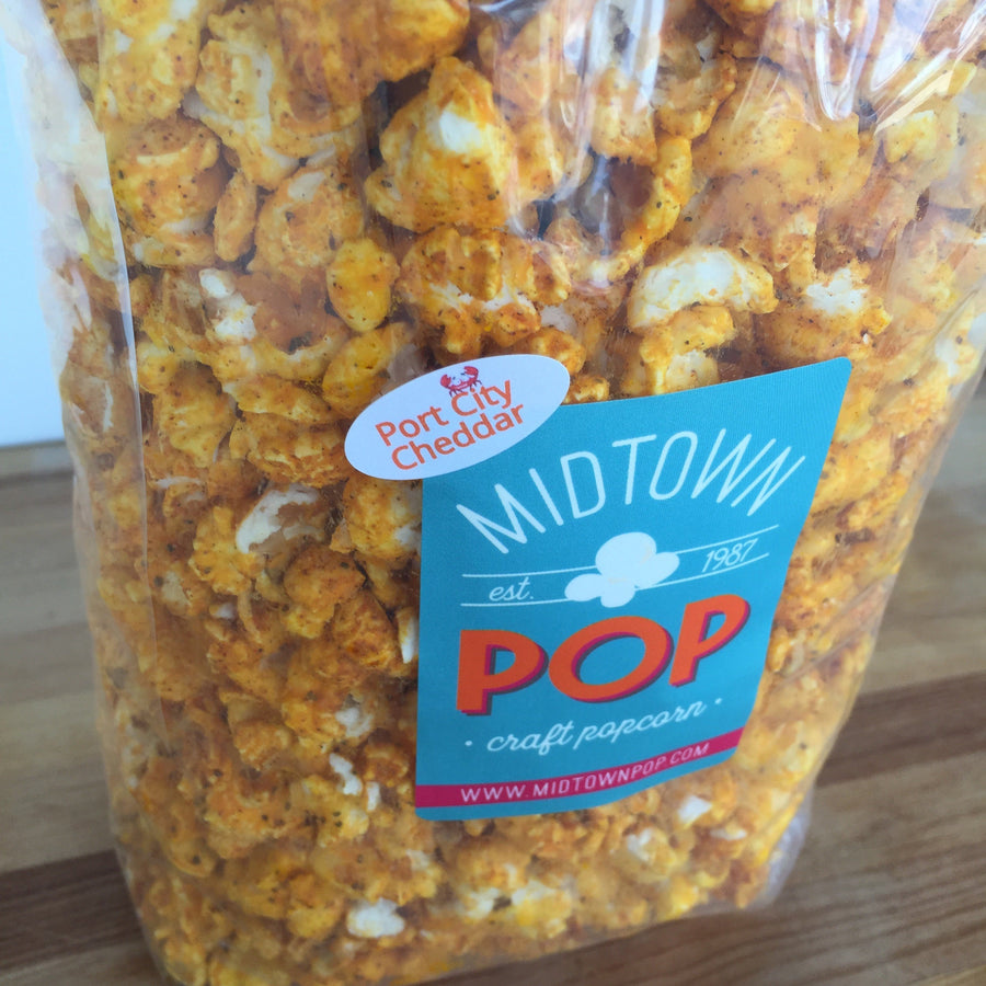 Close-up of a Port City Cheddar popcorn label
