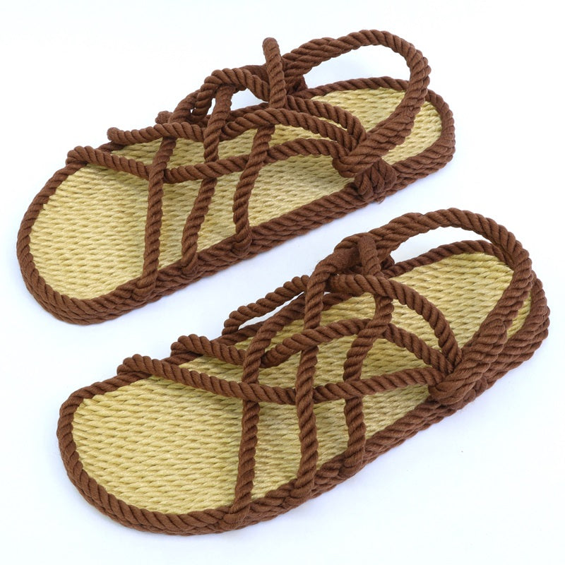 Pair of beige and brown Utopian rope sandals on a white background