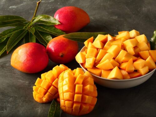Whole and diced mangoes illustrating the Mango Habanero flavor