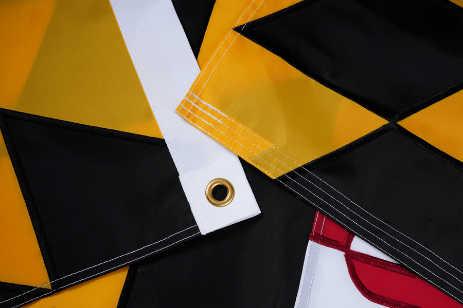 Maryland State Flag fabric, white heading, and brass-tone grommet