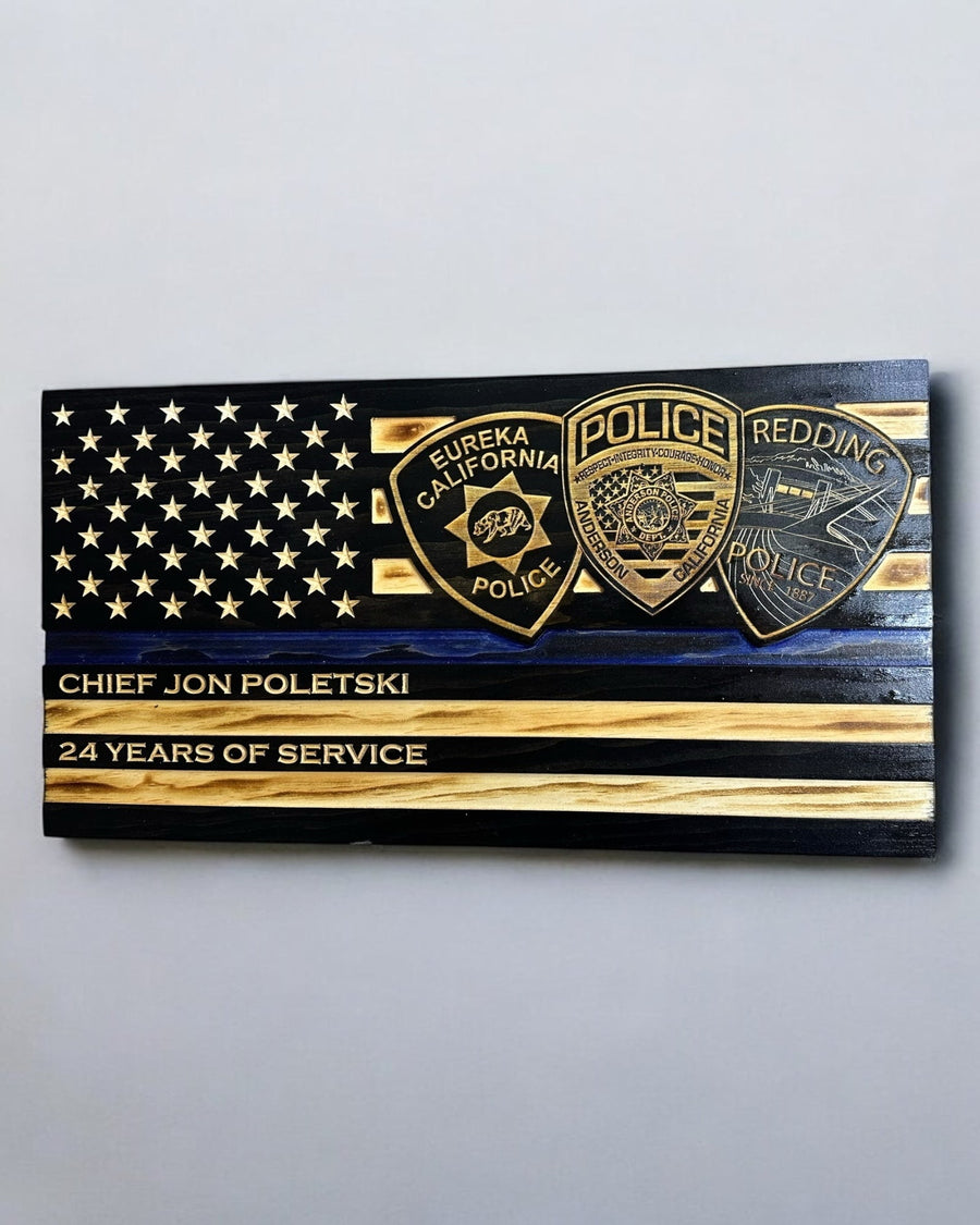 Law-enforcement flag with multiple badge engravings