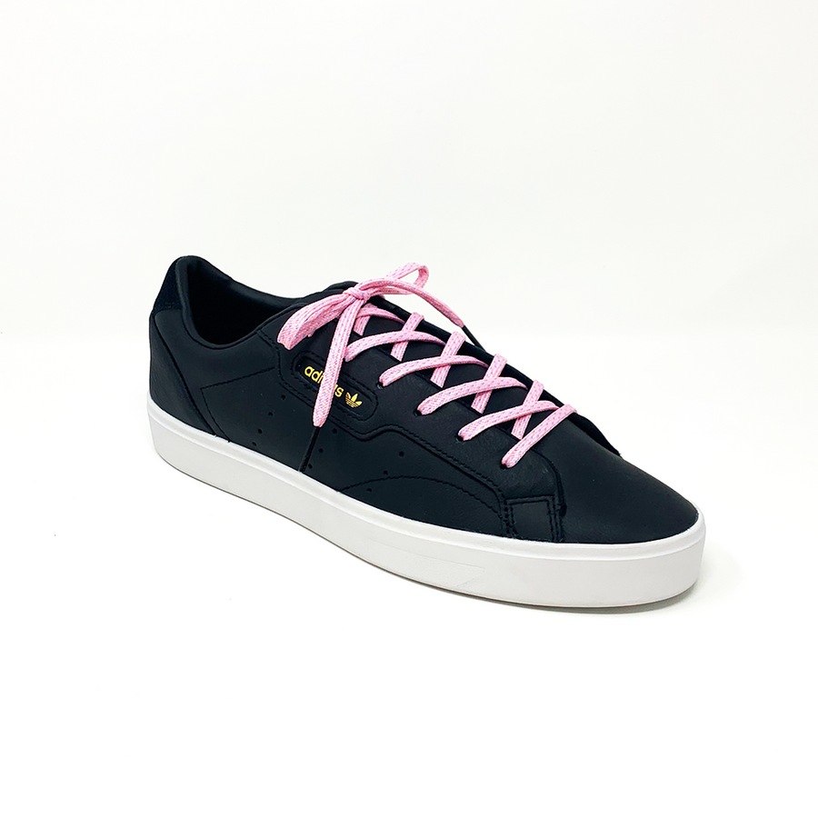 Pink & Light Blue ticked flat shoelaces laced into a black low-top sneaker