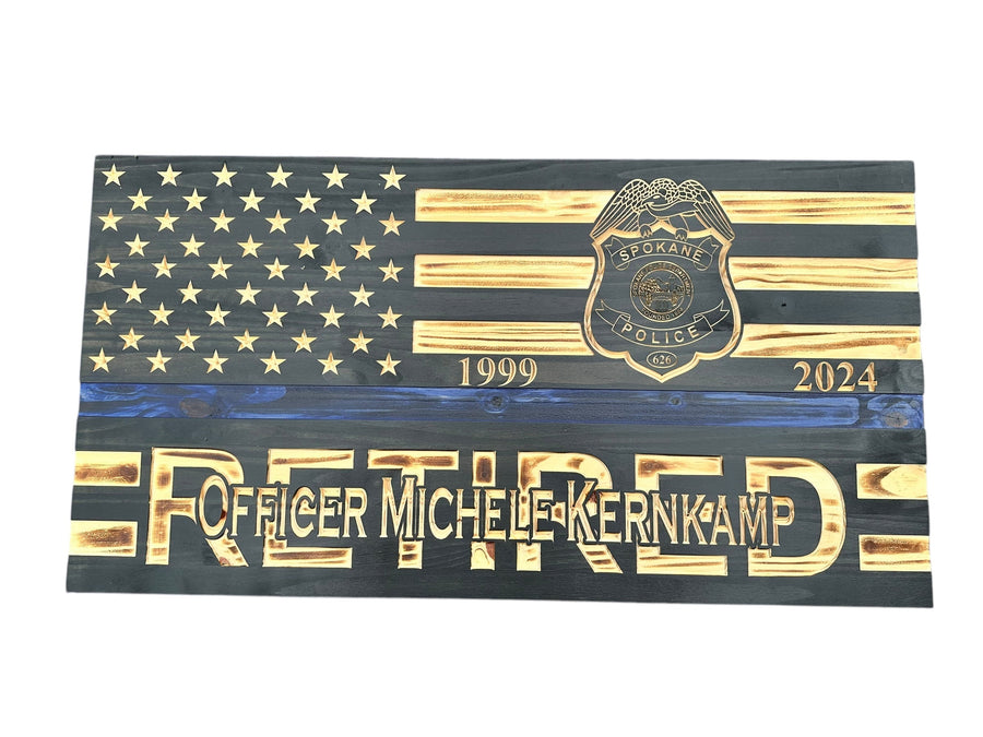 Custom wooden American flag retirement gift with engraved badge and name