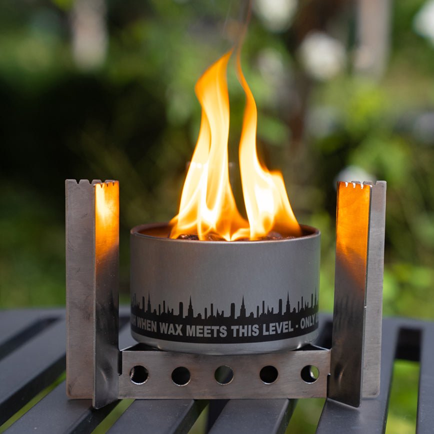 Bonfire flame in an assembled camp stove