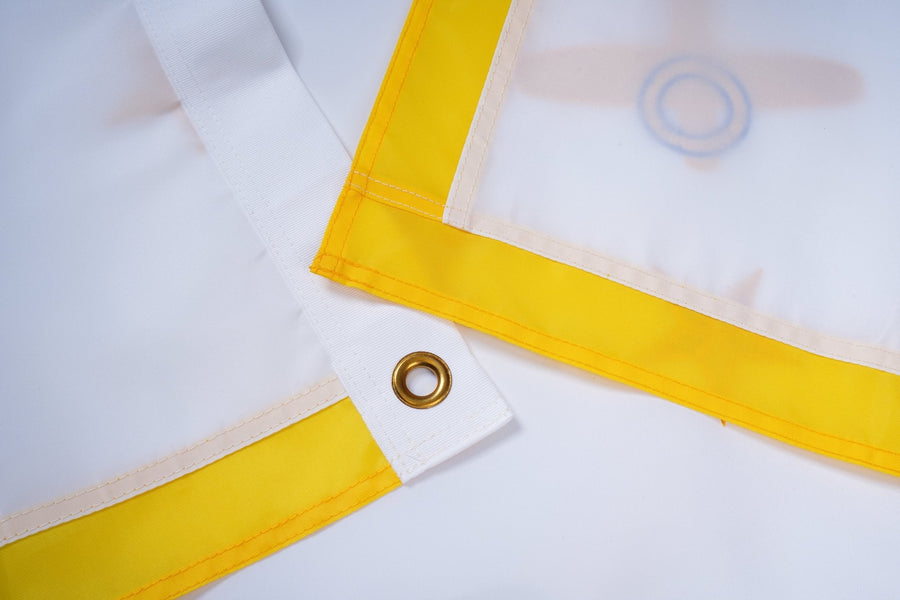 Rhode Island State Flag fabric, white heading, and brass-tone grommet