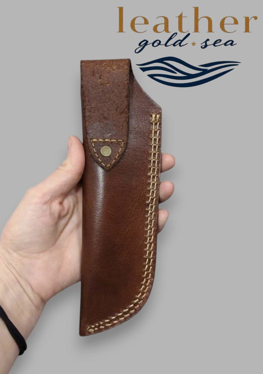 Rear snap strap on brown Western knife sheath
