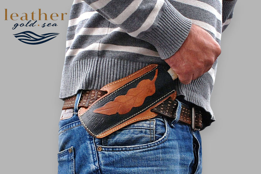 Horse-motif knife sheath demonstrated on a belt