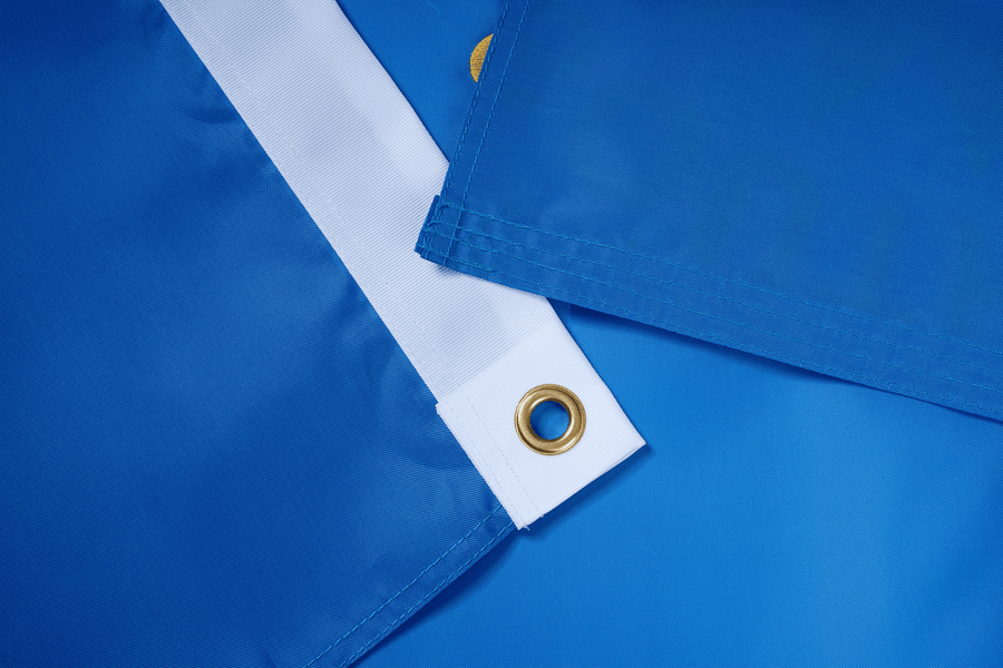 South Dakota State Flag fabric, white heading, and brass-tone grommet