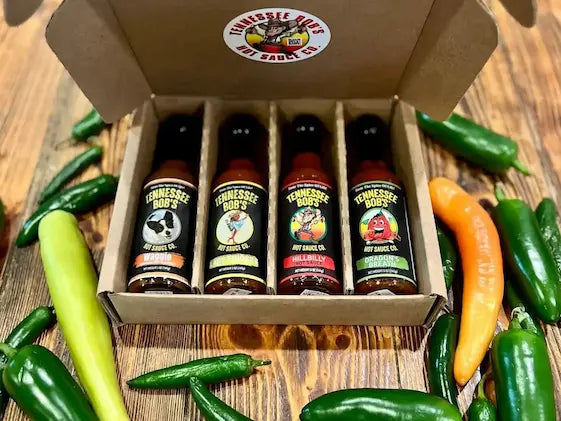 Four-bottle hot sauce sampler presentation