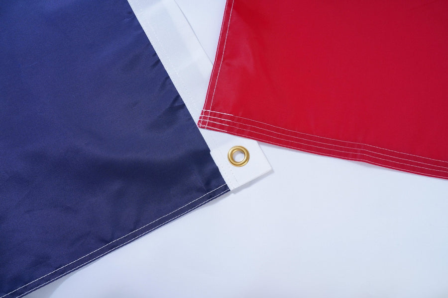 Texas State Flag fabric, white heading, and brass-tone grommet