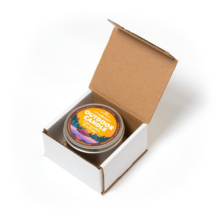 S’mores-fragrance citronella candle inside an open box