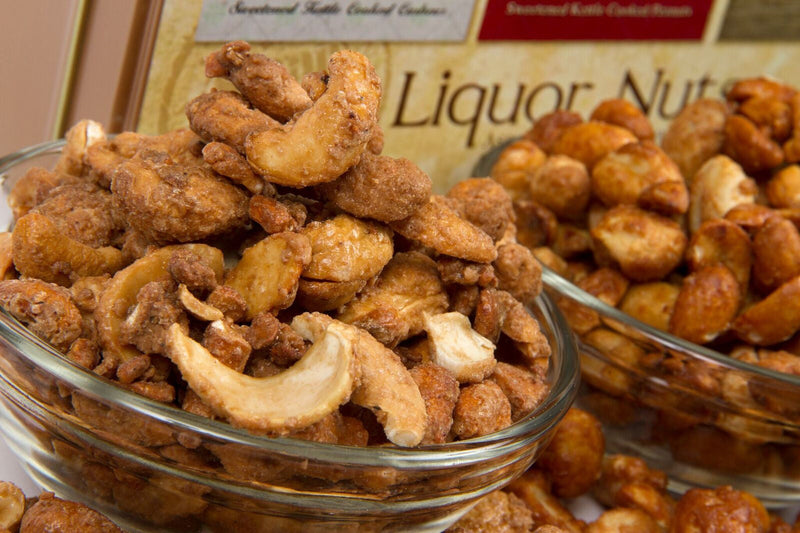 Assorted Beer & Bourbon Liquor Nuts Gift Tin with flavorful cashews, peanuts, and almonds in a glass bowl, perfect men's snack gift.