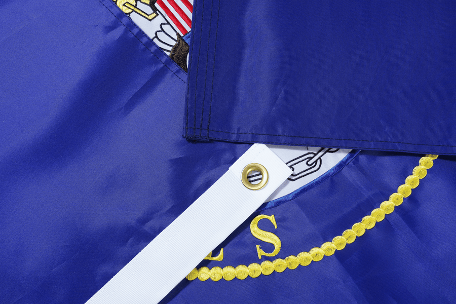 U.S. Navy flag with circular Navy seal emblem fabric, white heading, and grommet