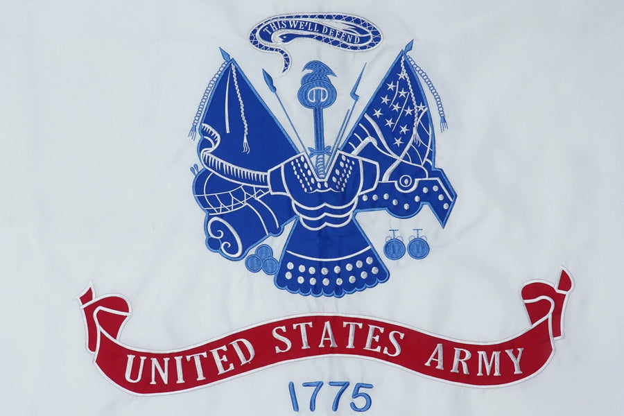 White U.S. Army flag emblem and stitching in close-up