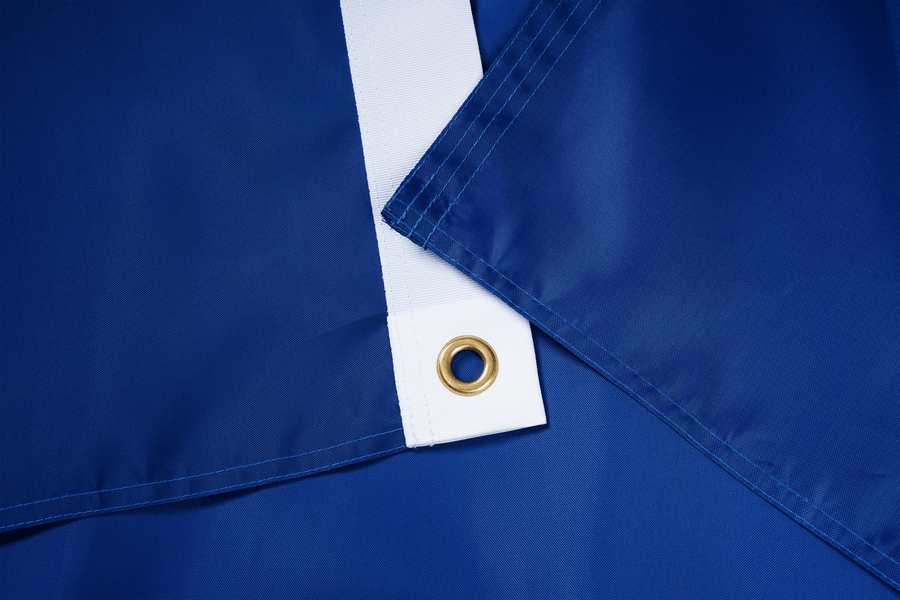 Vermont State Flag fabric, white heading, and brass-tone grommet