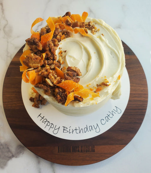 Gorgeous cake displayed on Virginia Boys Kitchens 13.5 Inch Round Walnut Cutting Board