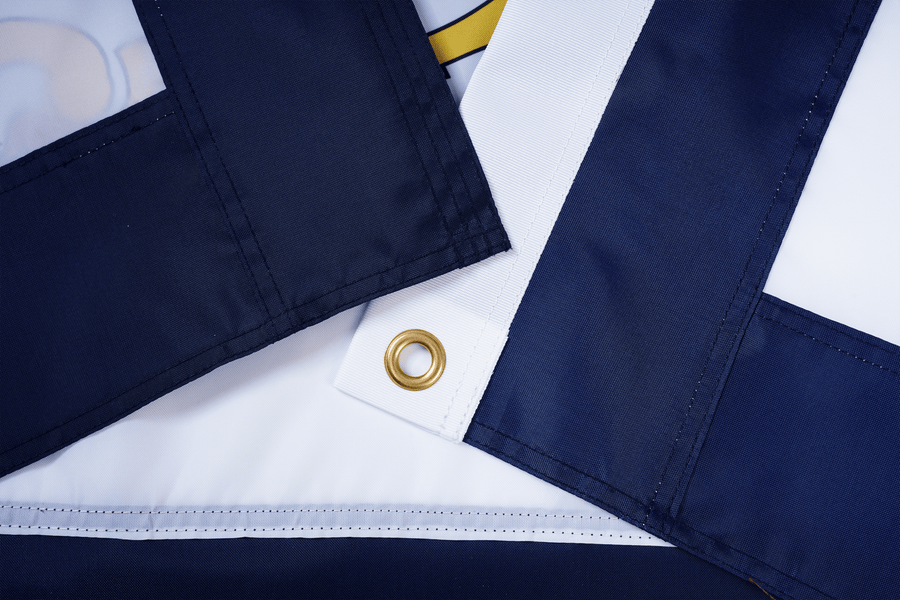 West Virginia State Flag fabric, white heading, and brass-tone grommet